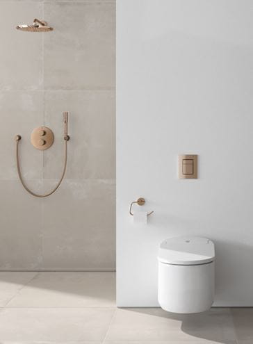GROHE RAINSHOWER nástěnný držák ruční sprchy, kartáčovaný Warm Sunset 27074DL0 Obrázek - fotka